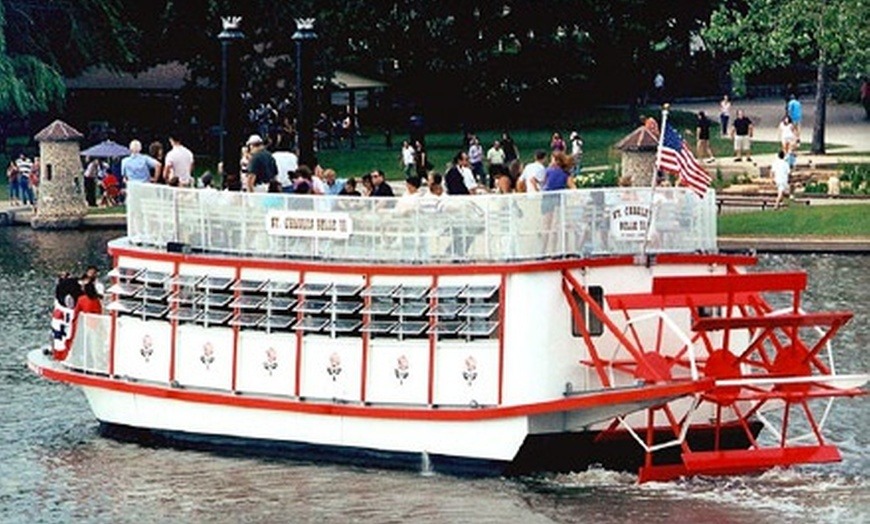 old fashioned paddlewheel riverboats on the Saint Charles river. 