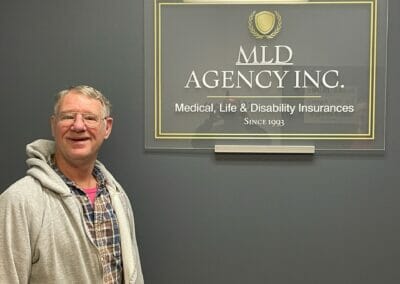 happy MLD customer enrolling in a Medicare Advantage plan